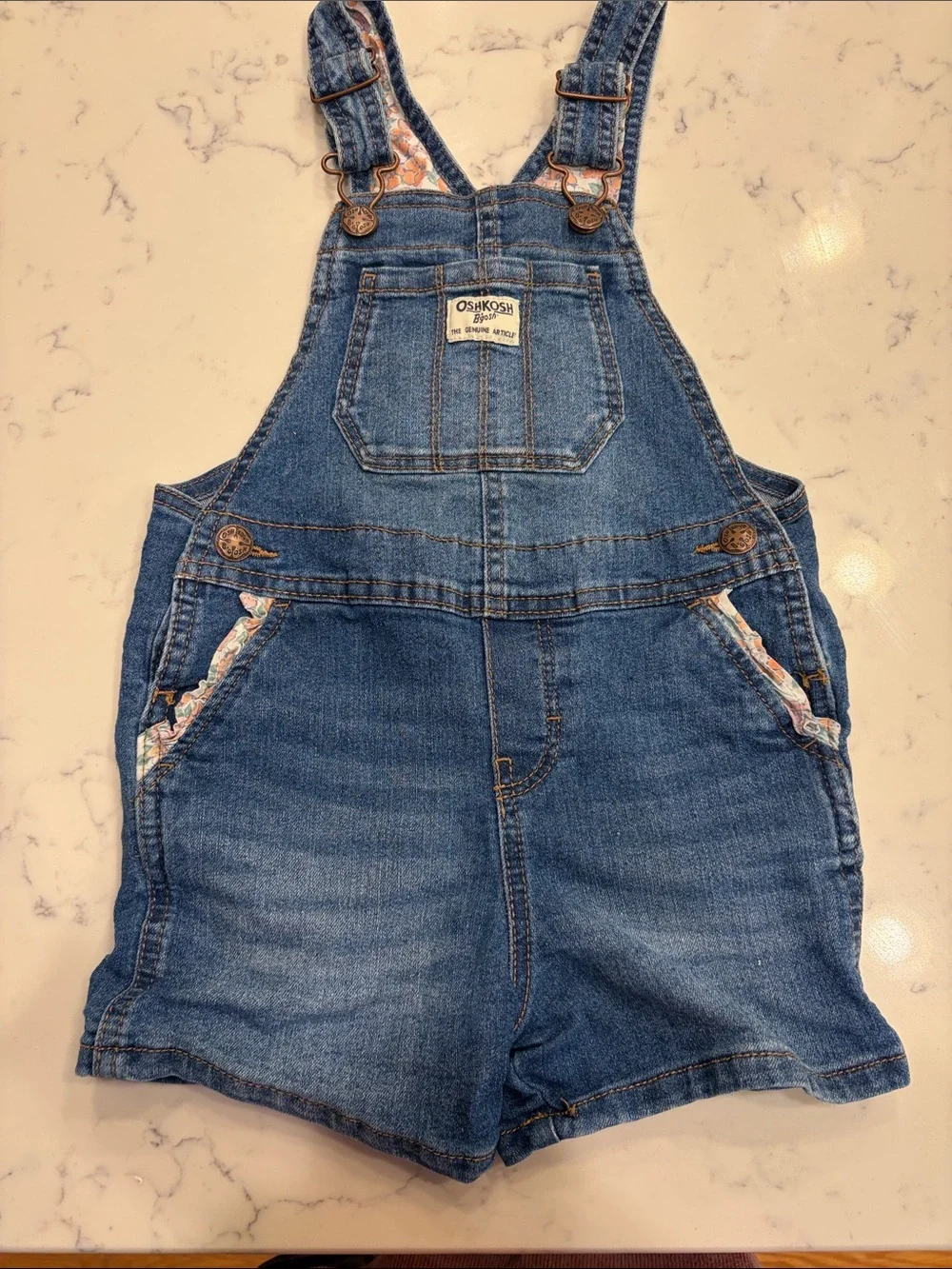OshKosh B'gosh Denim Shortall Overalls in Medium Blue with Floral Trim